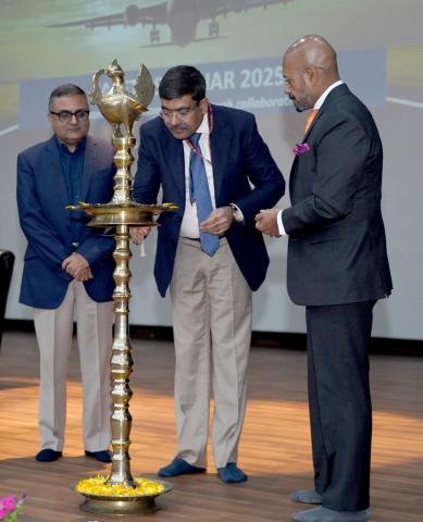 The Secretary of playinexchange apk download, Shri Samir Kumar Sinha lighting the lamp at the Safety Seminar 2025